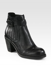 Urban leather staple with a tall stacked heel, adjustable buckle strap and side elastic gores for a casual-cool look. Stacked heel, 3 (75mm)Stacked platform, ½ (15mm)Compares to a 2½ heel (65mm)Leather upper with side elastic goresPull-on style with adjustable ankle strapLeather liningRubber solePadded insoleImported Urban leather staple with a tall stacked heel, adjustable buckle strap and side elastic gores for a casual-cool look. Stacked heel, 3 (75mm)Stacked platform, ½ (15mm)Compares to a 2½ heel (65mm)Leather upper with side elastic goresPull-on style with adjustable ankle strapLeather liningRubber solePadded insoleImported