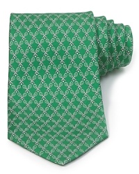 A luxurious piece that lies at the center of your dress wardrobe, this handsome tie from Salvatore Ferragamo is crafted in 100% Italian silk. A luxurious piece that lies at the center of your dress wardrobe, this handsome tie from Salvatore Ferragamo is crafted in 100% Italian silk.