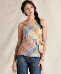 Brighten up summer days with this boho-inspired top from Tommy Hilfiger. Wrap styling with a tie at the waist is instantly flattering! Brighten up summer days with this boho-inspired top from Tommy Hilfiger. Wrap styling with a tie at the waist is instantly flattering!
