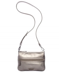 Have it your way: The convertible crossbody purse by Calvin Klein transforms into a sleek modern clutch. Have it your way: The convertible crossbody purse by Calvin Klein transforms into a sleek modern clutch.