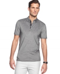 A button-down collar adds some extra polish to this pique polo shirt from Calvin Klein. A button-down collar adds some extra polish to this pique polo shirt from Calvin Klein.