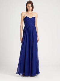 Richly-hued silk chiffon, in an elegant floor-length silhouette finished with a charming sweetheart neckline.Strapless sweetheart necklineRuched crossover bodiceFlared skirtConcealed back zipFully linedAbout 48 from natural waistSilkDry cleanImportedModel shown is 5'11 (180cm) wearing US size 4. Richly-hued silk chiffon, in an elegant floor-length silhouette finished with a charming sweetheart neckline.Strapless sweetheart necklineRuched crossover bodiceFlared skirtConcealed back zipFully linedAbout 48 from natural waistSilkDry cleanImportedModel shown is 5'11 (180cm) wearing US size 4.