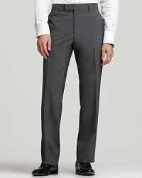 BOSS Black James Brown Trousers. Flat front pants in stretch fabric. 11 front rise, 18 leg opening. Double hook front tab closure. Side seam pockets, back buttoned welt pockets. In virgin wool elastane, cotton-lined to knee. BOSS Black James Brown Trousers. Flat front pants in stretch fabric. 11 front rise, 18 leg opening. Double hook front tab closure. Side seam pockets, back buttoned welt pockets. In virgin wool elastane, cotton-lined to knee.