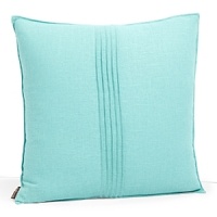A solid linen pillow in bright turquoise with pintuck pleats in the center and a pinched hem. Coordinates with the Mataveri collection. A solid linen pillow in bright turquoise with pintuck pleats in the center and a pinched hem. Coordinates with the Mataveri collection.