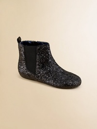 A not-so-basic pair of cozy boots gets a fancy update with chunky, eye-catching glitter.Pull-on style with elastic side panelRubber upperRubber solePadded insoleMade in the USA A not-so-basic pair of cozy boots gets a fancy update with chunky, eye-catching glitter.Pull-on style with elastic side panelRubber upperRubber solePadded insoleMade in the USA