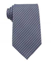 Check yourself in sleek style. This tie from Calvin Klein lets you power up with a pattern play. Check yourself in sleek style. This tie from Calvin Klein lets you power up with a pattern play.