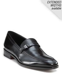 Polished leather exudes world class style in the form of Salvatore Ferragamo's Destiny shoe, made for a man of sophistication. Polished leather exudes world class style in the form of Salvatore Ferragamo's Destiny shoe, made for a man of sophistication.