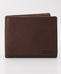 With clean lines and a supple leather design this traveler wallet from Fossil is the right choice for the well-dressed guy on the move. With clean lines and a supple leather design this traveler wallet from Fossil is the right choice for the well-dressed guy on the move.
