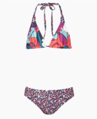 Tropical trends. She'll love the exotic floral prints on this two-piece swimsuit from Roxy, perfect for sunny fun on the sand. Tropical trends. She'll love the exotic floral prints on this two-piece swimsuit from Roxy, perfect for sunny fun on the sand.