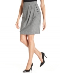 A dramatic swathe of houndstooth-checked fabric gives the impression of a wrap on Tahari by ASL's chic skirt. Decorative buttons and a touch of fringe finish the look.
