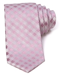 In silk satin, this gingham patterned tie lends a lighthearted, classic look. In silk satin, this gingham patterned tie lends a lighthearted, classic look.