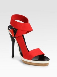 Sleek leather footbed topped with comfy-cool elastic straps that weave their way around the ankle. Self-covered heel, 5 (125mm)Covered platform, ¾ (20mm)Compares to a 4¼ heel (110mm)Elastic upperLeather liningBuffed leather solePadded insoleMade in ItalyOUR FIT MODEL RECOMMENDS ordering one size up as this style runs small. Sleek leather footbed topped with comfy-cool elastic straps that weave their way around the ankle. Self-covered heel, 5 (125mm)Covered platform, ¾ (20mm)Compares to a 4¼ heel (110mm)Elastic upperLeather liningBuffed leather solePadded insoleMade in ItalyOUR FIT MODEL RECOMMENDS ordering one size up as this style runs small.