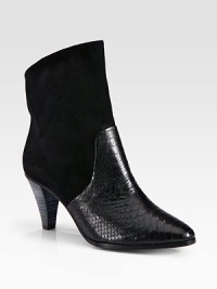 Fronted by a snake-print leather panel, this buttery suede ankle boot has a low-cut back and substantially stacked heel. Stacked heel, 3 (75mm)Suede and python-print leather upperLeather lining and solePadded insoleImportedOUR FIT MODEL RECOMMENDS ordering true size. Fronted by a snake-print leather panel, this buttery suede ankle boot has a low-cut back and substantially stacked heel. Stacked heel, 3 (75mm)Suede and python-print leather upperLeather lining and solePadded insoleImportedOUR FIT MODEL RECOMMENDS ordering true size.