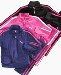 Keep it sporty. This streamlined velour track jacket and pants set from Puma is the perfect look to play in. Keep it sporty. This streamlined velour track jacket and pants set from Puma is the perfect look to play in.