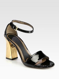 A sculpted goldtone heel characterizes this daring patent leather silhouette. Goldtone heel, 2 (50mm)Patent leather upperAdjustable ankle strapLeather lining and solePadded insoleMade in Italy