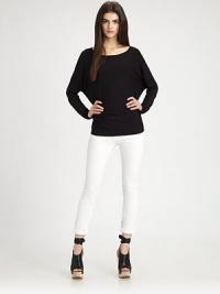 Slouchy-chic jersey boatneck has dropped shoulders, long dolman sleeves and an enticing open back. BoatneckDropped shouldersLong dolman sleevesHi-low hemOpen back95% micro modal/5% spandexDry cleanImportedModel shown is 5'10 (177cm) wearing US size Small.