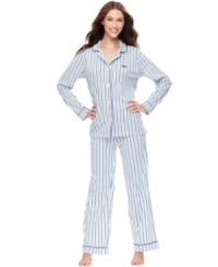 Stay warm and snug in DKNY's Cozy Fireside top and pajama pants. The long-sleeve top features trim detail at the ends, around the collar, and down the middle with DKNY embroidery on the left side. The pants feature a drawstring waistband with contrasting colors and pockets on both sides. Stay warm and snug in DKNY's Cozy Fireside top and pajama pants. The long-sleeve top features trim detail at the ends, around the collar, and down the middle with DKNY embroidery on the left side. The pants feature a drawstring waistband with contrasting colors and pockets on both sides.