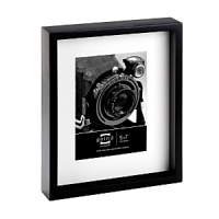 Display a treasured photograph in Prinz's black pine wood frame. White beveled matting highlights one 5 x 7 image while the shadow box design adds gallery-like impact. Display a treasured photograph in Prinz's black pine wood frame. White beveled matting highlights one 5 x 7 image while the shadow box design adds gallery-like impact.