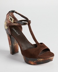 Rachel Zoe's Paloma sandals showcase a dual ankle strap silhouette with shiny, snakeskin embossed accents. Rachel Zoe's Paloma sandals showcase a dual ankle strap silhouette with shiny, snakeskin embossed accents.
