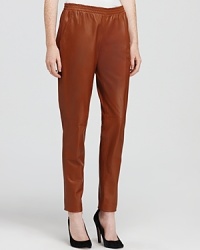 Indulge in the luxurious and incomparable comfort of these pure leather Theory pants--streamlined for a slim silhouette with easy pull-on styling. Indulge in the luxurious and incomparable comfort of these pure leather Theory pants--streamlined for a slim silhouette with easy pull-on styling.