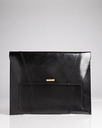 This Burberry iPad case keeps your digital device in check, crafted of rich leather with an interior zip pocket and two open pockets. This Burberry iPad case keeps your digital device in check, crafted of rich leather with an interior zip pocket and two open pockets.
