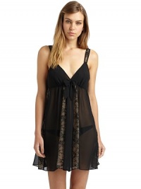 THE LOOKSemi-sheer designV-neckLace straps with contrast underlayElastic, gathered Empire waist with bow detailLace panels with contrast underlayV-backTHE FITAbout 33 from shoulder to hemTHE MATERIALPolyester/rayonCARE & ORIGINMachine washImportedModel shown is 5'9 (175cm) wearing US size Small. THE LOOKSemi-sheer designV-neckLace straps with contrast underlayElastic, gathered Empire waist with bow detailLace panels with contrast underlayV-backTHE FITAbout 33 from shoulder to hemTHE MATERIALPolyester/rayonCARE & ORIGINMachine washImportedModel shown is 5'9 (175cm) wearing US size Small.