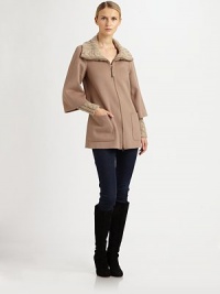 The definition of chic luxury, this cold-weather piece features stylish cable-knit details, convenient patch pockets and a phenomenal fit. Cable-knit collar and cuffsLeather detail at front zipperPatch pocketsAbout 30 from shoulder to hem80% wool/20% viscoseDry clean by leather specialistImported Model shown is 5'11 (180cm) wearing US size Small. The definition of chic luxury, this cold-weather piece features stylish cable-knit details, convenient patch pockets and a phenomenal fit. Cable-knit collar and cuffsLeather detail at front zipperPatch pocketsAbout 30 from shoulder to hem80% wool/20% viscoseDry clean by leather specialistImported Model shown is 5'11 (180cm) wearing US size Small.