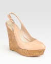 Supple leather upper with an adjustable slingback strap set atop a natural cork wedge and platform. Cork wedge, 5 (125mm)Cork platform, 1 (25mm)Compares to a 4 heel (100mm)Leather upperLeather lining and solePadded insoleImported