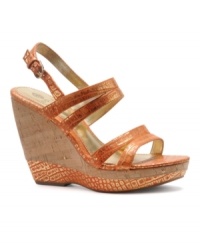 What summer wardrobe couldn't use a little spice? Find yours in the bold, metallic snake-print of the Oldeander wedge sandals by Isola. What summer wardrobe couldn't use a little spice? Find yours in the bold, metallic snake-print of the Oldeander wedge sandals by Isola.
