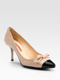 Bi-Color pointed toe design with bow detail. Self-covered heel, 3 (75mm)Patent leather upperLeather liningRubber solePadded insoleImportedOUR FIT MODEL RECOMMENDS ordering true size. Bi-Color pointed toe design with bow detail. Self-covered heel, 3 (75mm)Patent leather upperLeather liningRubber solePadded insoleImportedOUR FIT MODEL RECOMMENDS ordering true size.