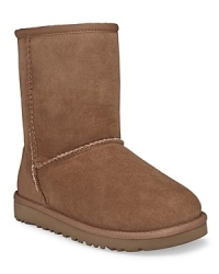 UGG Australia classic boots. Twin faced sheepskin with suede heel guard upper and molded EVA outsole. Insole of genuine sheepskin sock that naturally wicks away moisture and keeps feet dry. UGG Australia classic boots. Twin faced sheepskin with suede heel guard upper and molded EVA outsole. Insole of genuine sheepskin sock that naturally wicks away moisture and keeps feet dry.