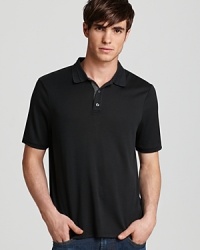 A plush blend of lavish silk and soft cotton jersey differentiate this fine polo from the standard market of pique. A plush blend of lavish silk and soft cotton jersey differentiate this fine polo from the standard market of pique.