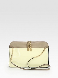 Sleek and simple patent and leather style has two-tone chain and leather straps for modern interest.Chain-and-leather shoulder straps, 15½ dropTop zip closure with dual pullsTwo inside open pocketsQuilted cotton lining12½W X 8½H X 2½DMade in Italy Sleek and simple patent and leather style has two-tone chain and leather straps for modern interest.Chain-and-leather shoulder straps, 15½ dropTop zip closure with dual pullsTwo inside open pocketsQuilted cotton lining12½W X 8½H X 2½DMade in Italy