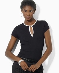 Rendered in fine-ribbed cotton, the soft short-sleeved tee is finished with a split neckline and an elegant faceted button. Rendered in fine-ribbed cotton, the soft short-sleeved tee is finished with a split neckline and an elegant faceted button.