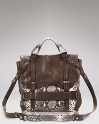 Kooba puts an exotic spin on the ever-chic satchel with embossed leather. Tapping this season's python obsession has never been easier, simply carry this roomy bag for an instant update. Kooba puts an exotic spin on the ever-chic satchel with embossed leather. Tapping this season's python obsession has never been easier, simply carry this roomy bag for an instant update.