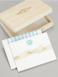 Packed in a gold-stamped wood box, these elegant cards have a charming cupcake motif, letterpressed by hand on creamy cotton stock, making them a delightful invitation to any celebration.Original Charles Fradin illustrationLetterpressed by hand100% cotton stock6.5L X 4.75WCoordinating envelopes with blue striped liningSet of 18, with envelopesGold-stamped wood storage boxMade in USA