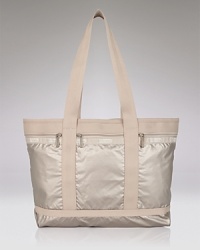 Carry your weekend essentials in style with this durable nylon travel tote from LeSportsac.