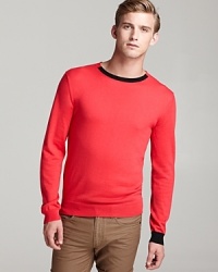 A fun, easy-going crewneck sweater from the master of carefree-modern-retro, MARC BY MARC JACOBS, with a pinch of designer flair at the front collar for good measure. A fun, easy-going crewneck sweater from the master of carefree-modern-retro, MARC BY MARC JACOBS, with a pinch of designer flair at the front collar for good measure.