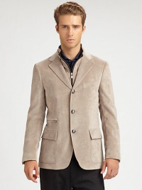 Expect the unexpected with this military-inspired three-button blazer shaped in the supreme softness of water resistant micro-suede, featuring a zip-out front vest panel and leather interior detail.Button-frontNotch lapelChest welt, waist flap pocketsSuedeDry cleanMade in Italy Expect the unexpected with this military-inspired three-button blazer shaped in the supreme softness of water resistant micro-suede, featuring a zip-out front vest panel and leather interior detail.Button-frontNotch lapelChest welt, waist flap pocketsSuedeDry cleanMade in Italy