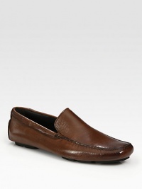 Soft, hand burnished leather with unmistakable style, defines this smooth, sleek slip-on style. here.Leather upperLeather liningPadded insoleLeather soleMade in Italy Soft, hand burnished leather with unmistakable style, defines this smooth, sleek slip-on style. here.Leather upperLeather liningPadded insoleLeather soleMade in Italy