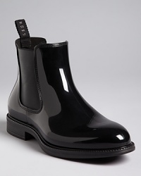 In shiny rubber and classic slip-on style, this BOSS rain boot brightens the cloudiest day. In shiny rubber and classic slip-on style, this BOSS rain boot brightens the cloudiest day.