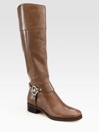 Casual leather staple with a western-inspired harness and shiny gold metal hardware. Stacked heel, 1¼ (30mm)Stacked platform, ½ (15mm)Compares to a ¾ heel (20mm)Leather upperSide zipLeather lining and solePadded insoleImported Casual leather staple with a western-inspired harness and shiny gold metal hardware. Stacked heel, 1¼ (30mm)Stacked platform, ½ (15mm)Compares to a ¾ heel (20mm)Leather upperSide zipLeather lining and solePadded insoleImported