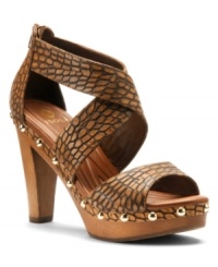 Coil around with style with Isola's Morela sandals. The slinky snake print straps lend an air of exoticism to your workday look. Coil around with style with Isola's Morela sandals. The slinky snake print straps lend an air of exoticism to your workday look.