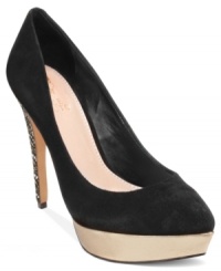 Glamourous style is but a step away. Vince Camuto's Ritz platform pumps feature a smooth almond toe and a glitter-covered platform and heel. Glamourous style is but a step away. Vince Camuto's Ritz platform pumps feature a smooth almond toe and a glitter-covered platform and heel.