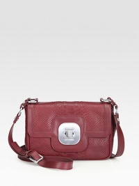 This petite design features lovely python embossed leather accented with smooth leather trim and logo detailed hardware.Adjustable shoulder strap, 23-25½ dropTurnlock flap closureOne inside zip pocketFully lined8½W X 6¼H X 3DImported This petite design features lovely python embossed leather accented with smooth leather trim and logo detailed hardware.Adjustable shoulder strap, 23-25½ dropTurnlock flap closureOne inside zip pocketFully lined8½W X 6¼H X 3DImported