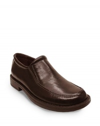 Injected with a Nike Air™ inset at the heel, this handsome leather dress shoe from Cole Haan doubles as an all-day walking shoe. Injected with a Nike Air™ inset at the heel, this handsome leather dress shoe from Cole Haan doubles as an all-day walking shoe.
