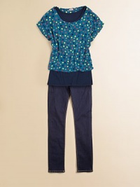 A mod-inspired, colorful polka dot print adorns this cute, layered look top.ScoopneckShort cuffed sleevesPullover styleLayered-look hemRayonMachine washImported A mod-inspired, colorful polka dot print adorns this cute, layered look top.ScoopneckShort cuffed sleevesPullover styleLayered-look hemRayonMachine washImported