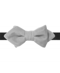 Keep it skinny for super-sized impact with this velveteen bow tie from Countess Mara. Keep it skinny for super-sized impact with this velveteen bow tie from Countess Mara.