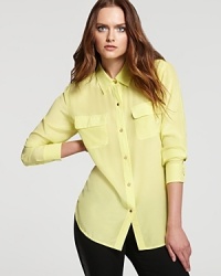 Freshen your everyday look with a zesty Juicy Couture blouse, touting an oversized silk silhouette for a luxe approach to laidback style. Freshen your everyday look with a zesty Juicy Couture blouse, touting an oversized silk silhouette for a luxe approach to laidback style.