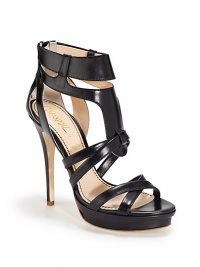 THE LOOKCurved and crisscrossed strapsBack zip closureCovered stiletto heel 5 (125mm)Wooden platform, 1 (25mm)Compares to a 4 heel (100mm)THE MATERIALLeather upperLeather lining and soleORIGINMade in Italy THE LOOKCurved and crisscrossed strapsBack zip closureCovered stiletto heel 5 (125mm)Wooden platform, 1 (25mm)Compares to a 4 heel (100mm)THE MATERIALLeather upperLeather lining and soleORIGINMade in Italy